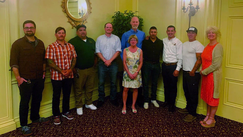 [L-R] IS Manager Brad Wright, Logistics Manager Dale Lauby, Potting Foreman Ernesto Salamanca, Production Manager Jeremy Maddess, Lorne and Aurelea Blackman, Manager of Growing Operations Noel Ortiz, Operations Manager Alex Ramos, Retail Partner Cody Connor and Customer Service Manager Jo Anne Simons.